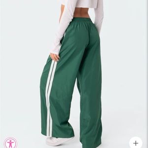 Green nylon track pants - small